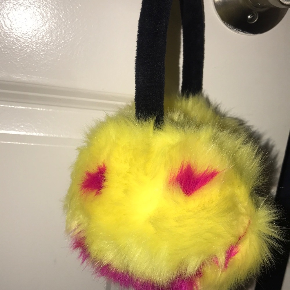 Yellow ear muffs one time use great condition .